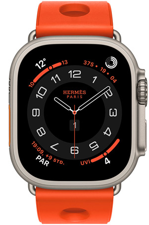 Apple Watch Hermès Ultra 3, analoges Zifferblatt Circulaire, (Stunden-, Minuten- und Sekundenzeiger, Komplikationen: Wetter, Aktivitätsringe, Paris Zeit und UV Index), Titangehäuse, Farbe Natur, rechte Seite, Digital Crown, erhöhte Seitentaste, kombiniert mit Scub’H Diving Armband, Farbe Orange Néon (leuchtendes Orange), geformtes Gummi, kreisförmige Aussparungen in der Mitte