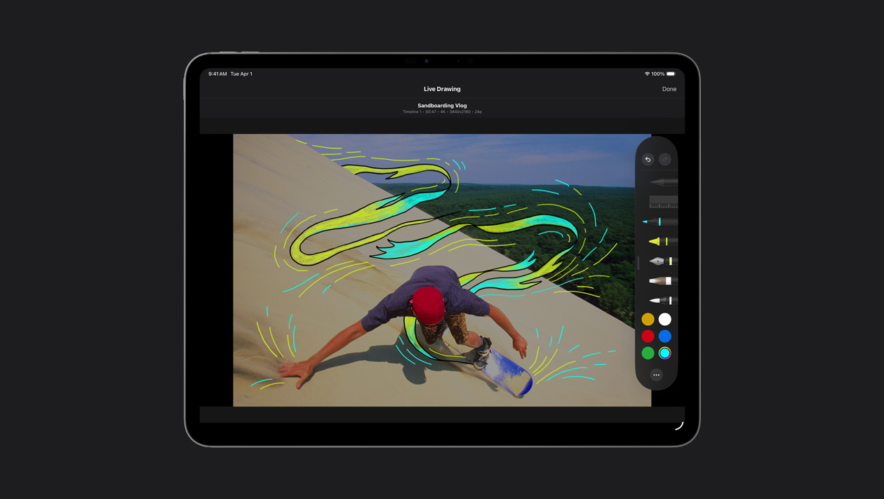 iPad Pro 13, skater on sand dunes with yellow and blue motion lines around him, demo of Live Drawing