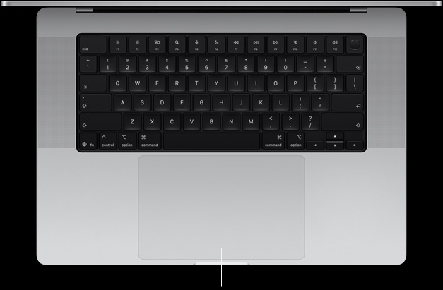 Top-down view of open MacBook Pro 16-inch showing Force Touch trackpad located below keyboard